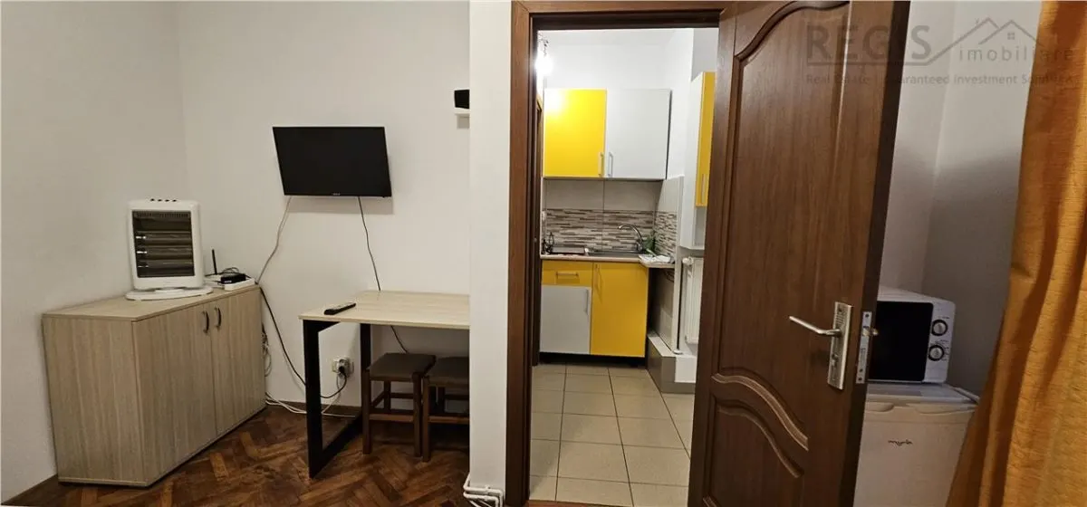 Garsoniera in inima Brasovului - foto 4