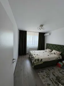 Are client suna marti 17.08.Apartament 2 camere Tractorul Grandis Residence,parcare,mobilat-utilat 142800 Euro - foto 3