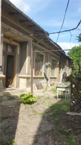 zona Bd. Cuza casa caramida cu teren=290mp ,4 cam 105mp construiti - Braila