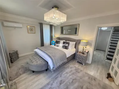 Vila premium de vanzare in Copou – 320 mp | 4 niveluri | 4 suite | 6 bai | Mobilata si utilata complet - foto 8