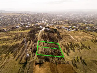 RECO Teren  intravilan- panorama asupra orasului -str. Caisilor - foto 5