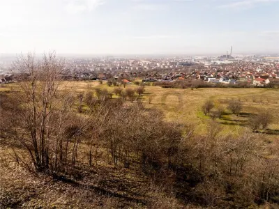 RECO Teren  intravilan- panorama asupra orasului -str. Caisilor - foto 9