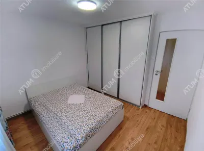 De vanzare apartament renovat cu 3 camere 2 bai si pivnita in Sibiu - foto 4