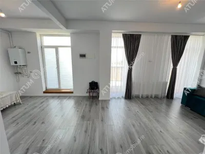 De vanzare apartament cu 2 camere terasa 40 mp si 2 locuri de parcare situat in zona Vasile Aaron din Sibiu - Sibiu