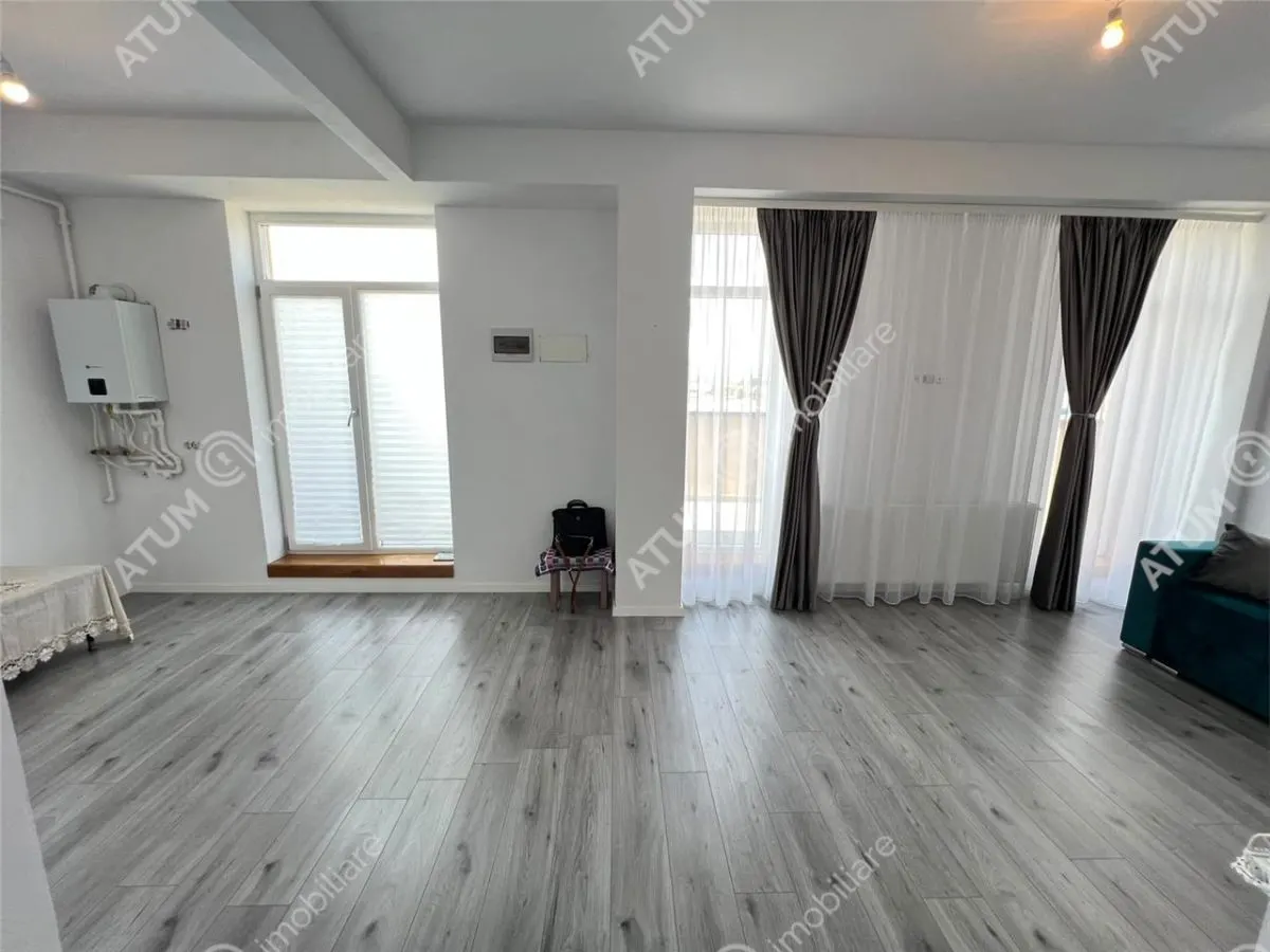 De vanzare apartament cu 2 camere terasa 40 mp si 2 locuri de parcare situat in zona Vasile Aaron din Sibiu - Sibiu