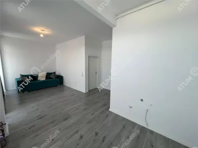 De vanzare apartament cu 2 camere terasa 40 mp si 2 locuri de parcare situat in zona Vasile Aaron din Sibiu - foto 16