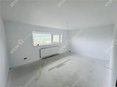 Casa individuala de vanzare 4 camere 2 bai si terasa pe teren 1170 mp in Cisnadioara - foto 10