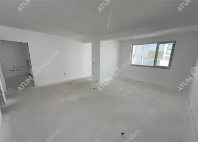 Casa de vanzare cu 4 camere 2 bai 2 balcoane si curte libera de 50 mp situata in zona Calea Cisnadiei din Sibiu - Sibiu