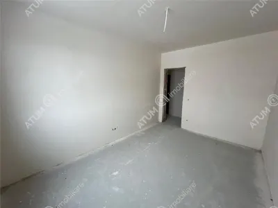 De vanzare apartament intabulat cu 3 camere decomandate 2 bai balcon si loc de parcare situat in Talmaciu/ Sibiu - foto 4