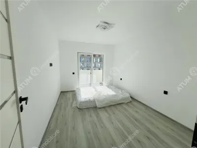 De vanzare apartament la alb cu 2 camere gradina si loc de parcare inclus zona Doamna Stanca/Selimbar - foto 3