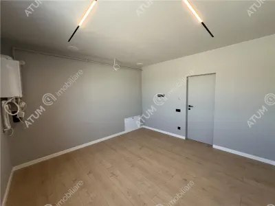 De vanzare penthouse cu 3 camere 2 bai si 2 terase zona Calea Surii Mici din Sibiu - foto 17