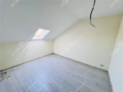 Apartament de vanzare cu 3 camere 2 bai situat in zona Rahovei din Sibiu - foto 5
