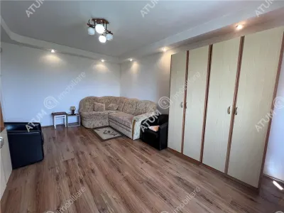 De vanzare apartament cu 2 camere decomandate cu boxa si pivnita zona Vasile Aaron din Sibiu - foto 2