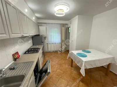 De inchiriat apartament cu 3 camere decomandate in zona Vasile Aaron din Sibiu - foto 9