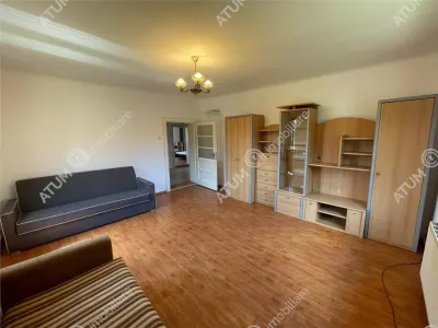De inchiriat apartament cu 3 camere decomandate si curte comuna situat la etajul 1 al unei case din zona Tiglari Sibiu - Sibiu