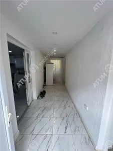 De vanzare casa individuala compusa din 2 corpuri si teren 2000 mp Localitatea Chirpar Sibiu - foto 9