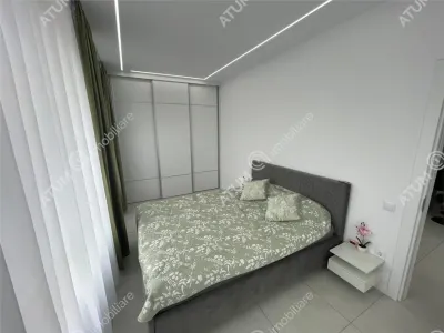De inchiriat apartament tip penthouse cu 2 camere terasa si loc de parcare in zona Calea Surii Mici din Sibiu - foto 4
