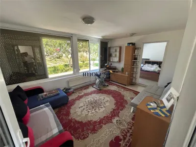 Casa spatioasa de vanzare in Decebal, judetul Satu Mare | 4 dormitoare | Teren 900 mp | Ideala pentru familie sau investitie - foto 11