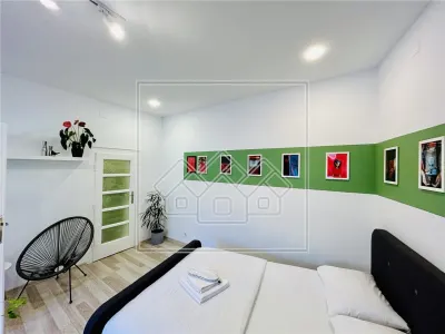 Garsoniera moderna, 44 mp utili, complet renovata, pretabil investitie - foto 9