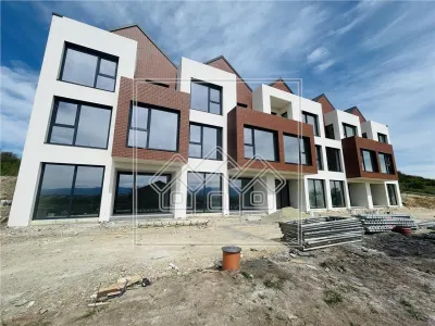 Casa cu 4 camere, 3 bai, teren de 284 mp, 2 locuri de parcare - Sibiu