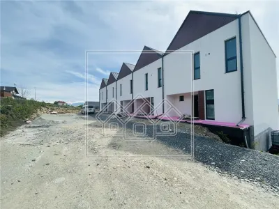 Casa cu 4 camere, 3 bai, teren de 284 mp, 2 locuri de parcare - foto 3