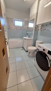Decomandat etaj1 cu 2 bai si 2 balcoane in bloc anvelopat - foto 6