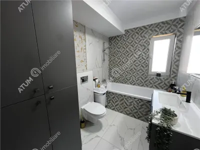De vanzare casa individuala cu 4 camere 2 bai si 250 mp de teren situata in Cristian - foto 9