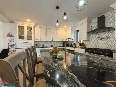 Vila impunatoare cu 6 camere spatioase in stil american - foto 3