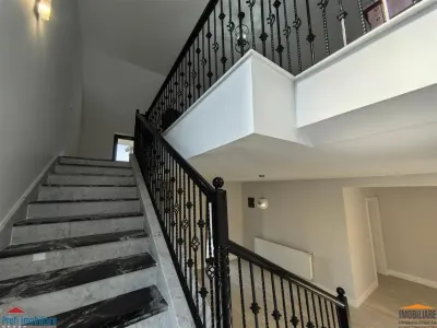 Vila impunatoare cu 6 camere spatioase in stil american - foto 23