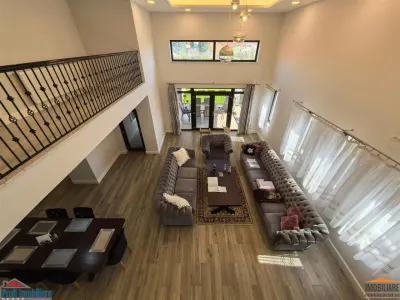 Vila impunatoare cu 6 camere spatioase in stil american - foto 25