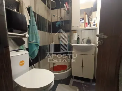 Apartament 4 camere, decomandat, 3 dormitoare, 2 bai, zona Fratelia. - foto 8