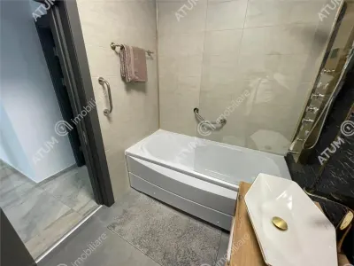 De inchiriat apartament modern cu 3 camere balcon si loc de parcare in zona Selimbar din Sibiu - foto 10