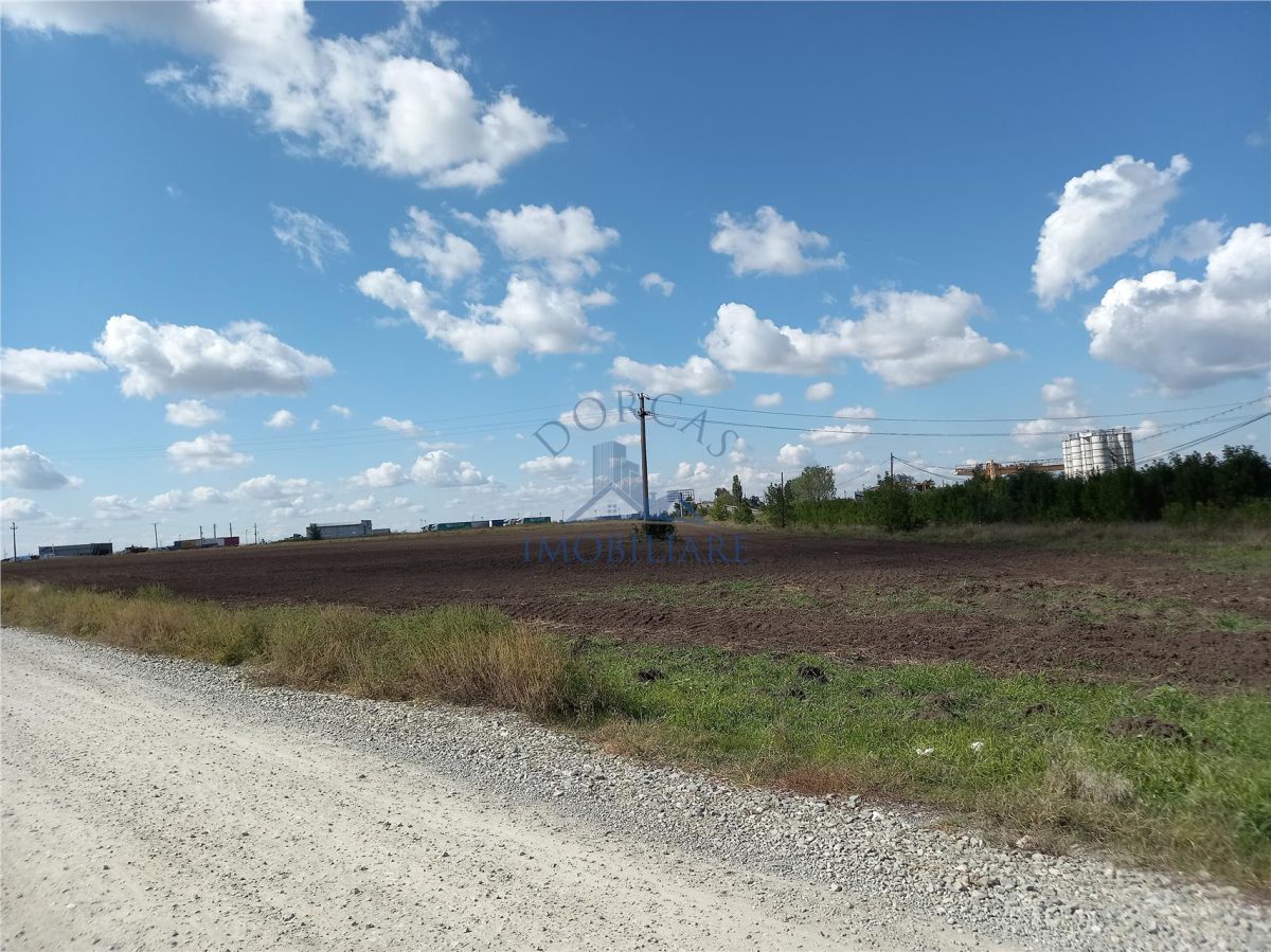 Teren intravilan la DN 65,zona pod Ciromat-QFort. - Craiova